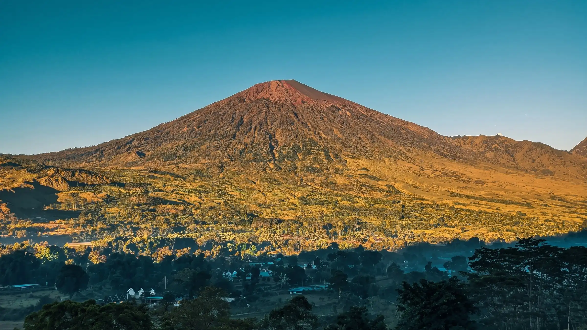 Mountain landscape near Pergasingan Hill in golden morning light